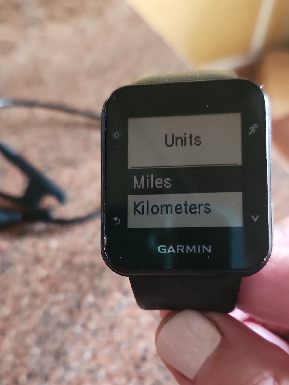 garmin black fitness smartwatch with monochrome display